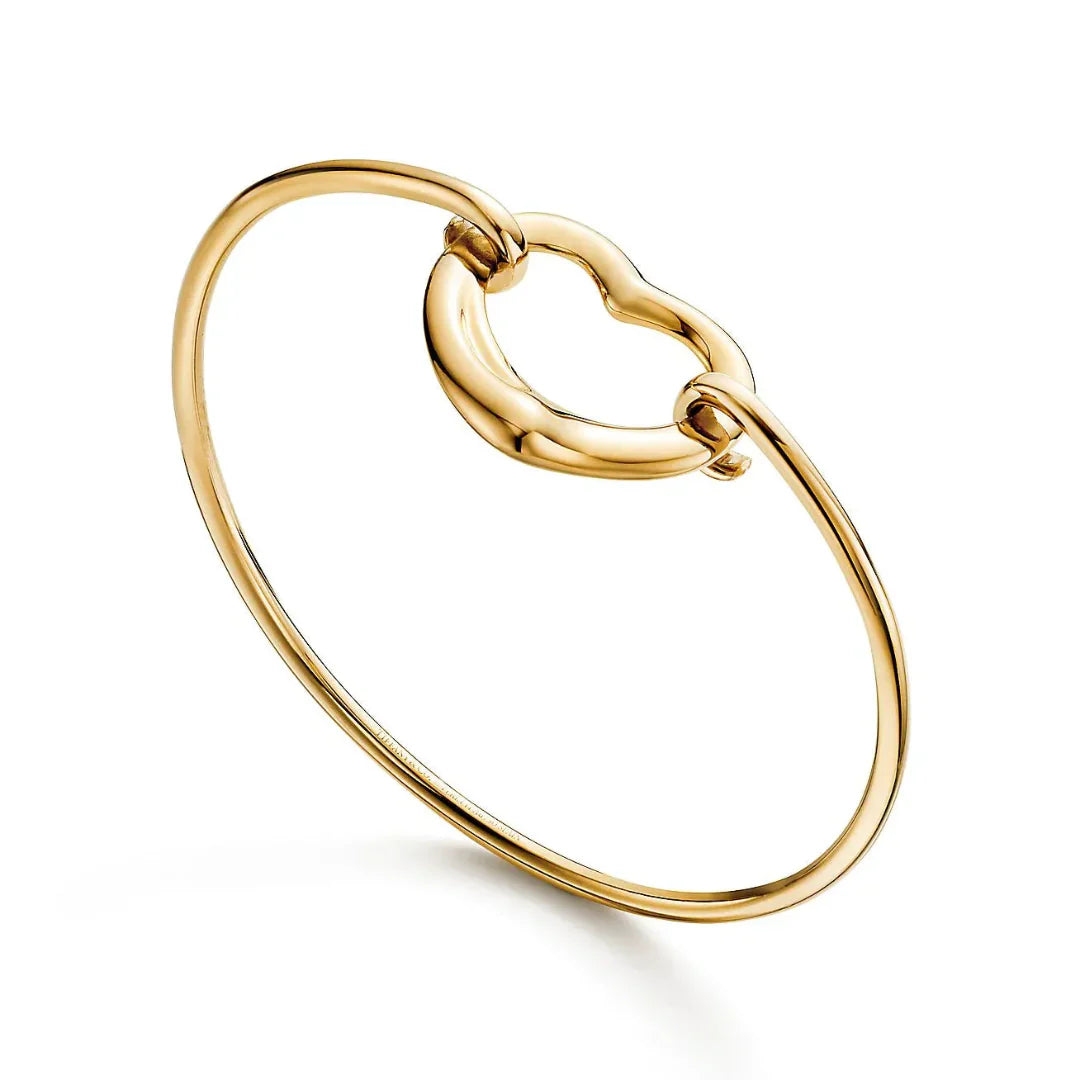 Open Heart Bangle in Yellow Gold