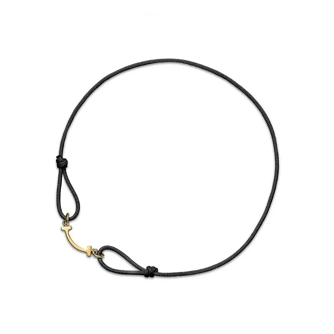 T Smile Bracelet with Black Cord in 18k Yellow Gold