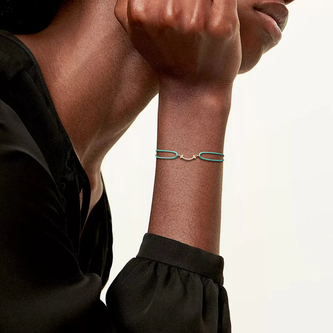 T Smile Bracelet with Rose Gold on a Blue Cord